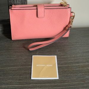 Wallet, can be carried alone or in a tote.